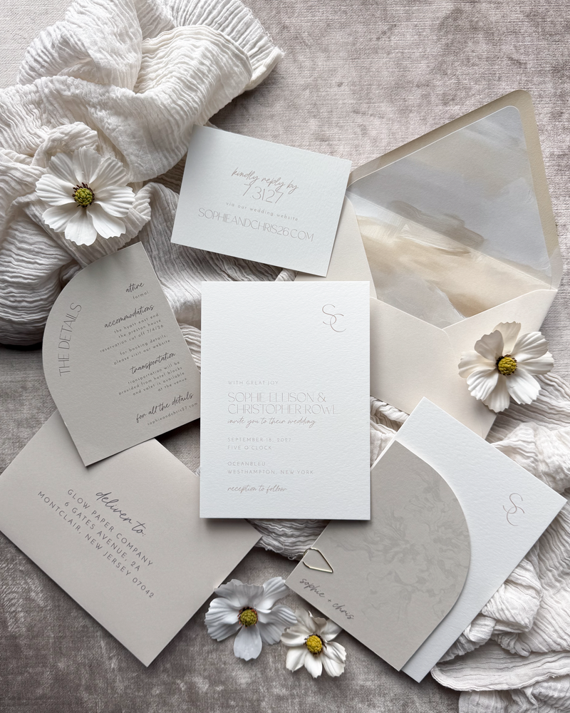 Wedding Invitation suite featuring modern typography in shades of beige and seaside inspiration
